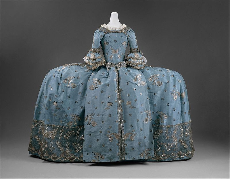 1750s Court dress. A mantua with panniers to widen the skirt. Image: Public domain.