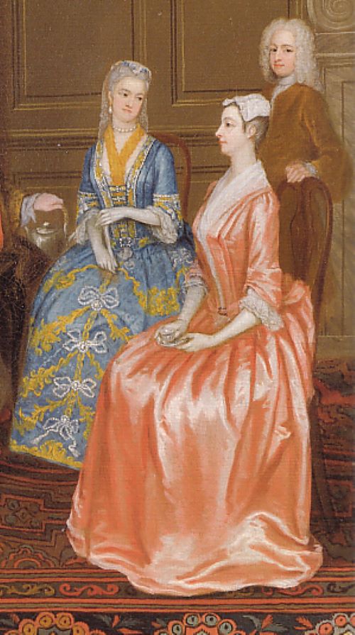 Fashionably dressed for a 1730s tea party. The ladies are wearing formal mantuas. Image: Public domain.