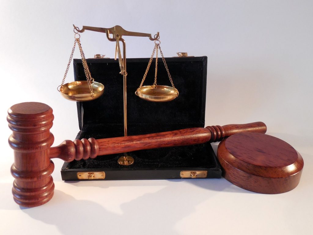 Scales of justice, judge's gavel. Image: Public domain. 