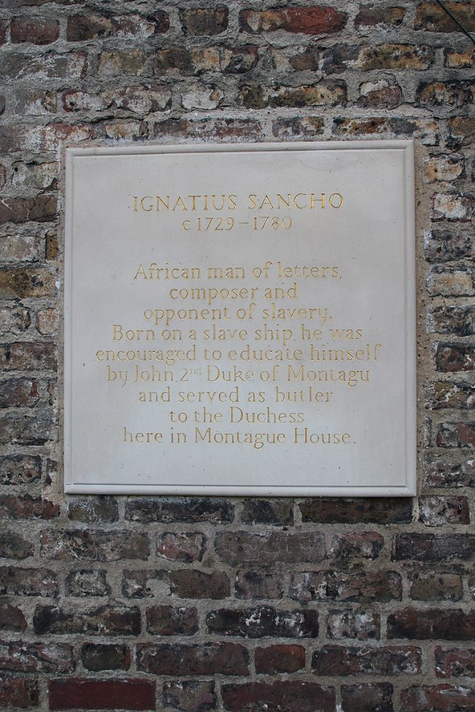 A plaque on the site of Montagu House, Greenwich Park to honour Ignatius Sancho, black British abolitionist. Image: Wikipedia. PaulW CC4.0.